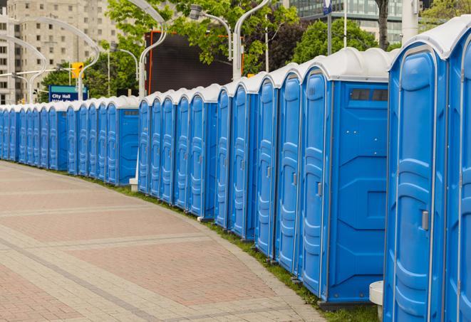 a row of portable restrooms at a fairground, offering visitors a clean and hassle-free experience in Albany